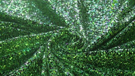 Luminous-Green-Sequin-Fabric-Twisted-Into-a-Spiral-with-a-Shimmering-Surface-Reflecting-Light